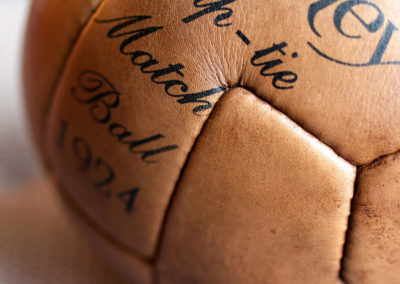 The seams of the 12 panels of a vintage soccer ball