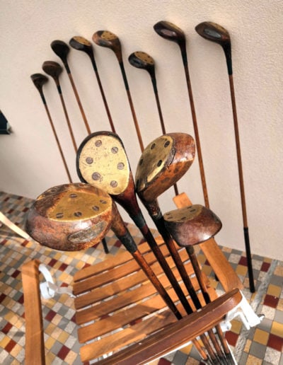 Old wooden golf club in the sun