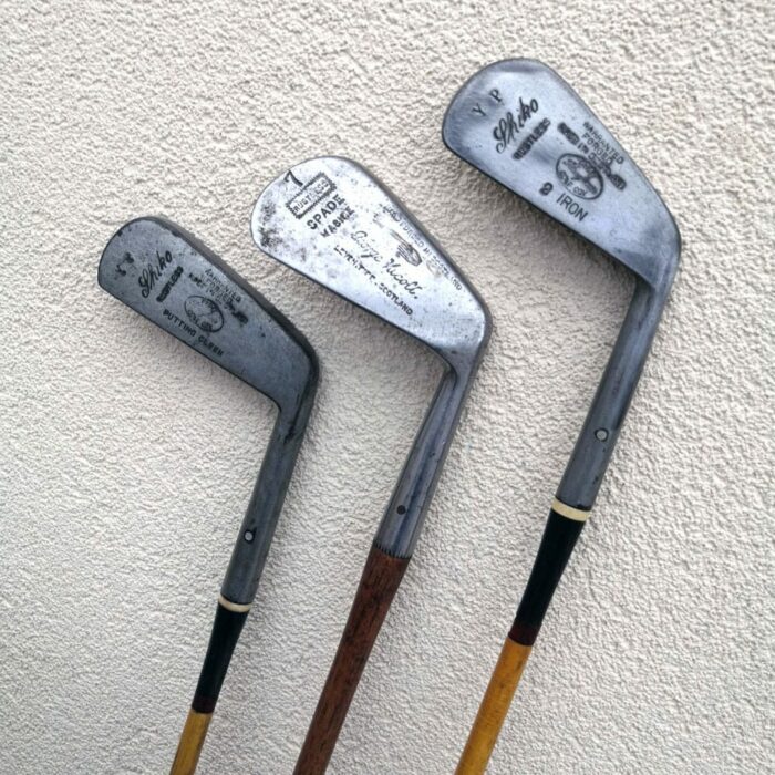 3 old but renovated golf irons with shiny heads