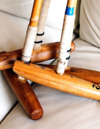 Old polo mallet in a set on a sofa