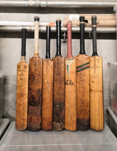 7 cricket bats in reception at the workshop