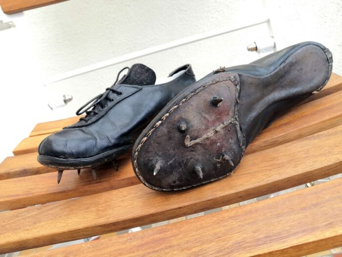 View on the old spikes of an athletic shoe