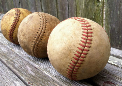 Baseball series presented on a wooden bench