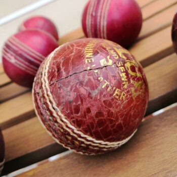 A square photo of the cricket ball presented in macro