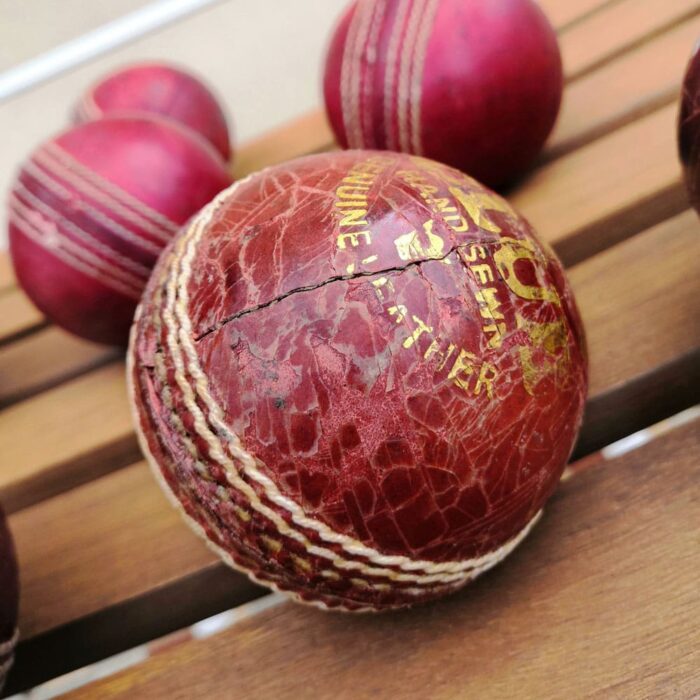 A square photo of the cricket ball presented in macro