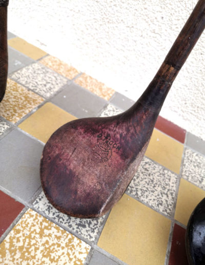 Very old golf club with wooden head