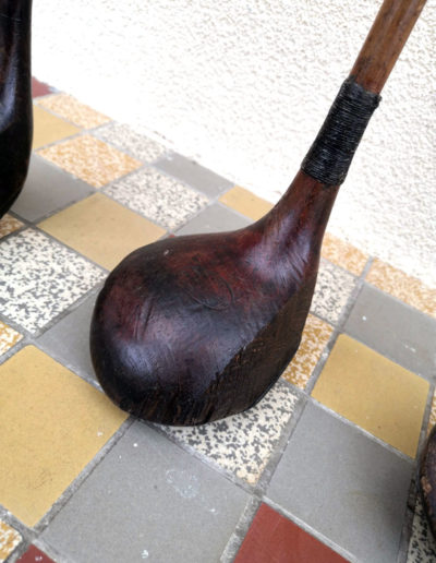 A slightly shiny antique golf club head