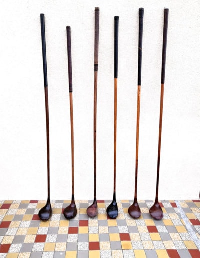 A set of old wooden clubs