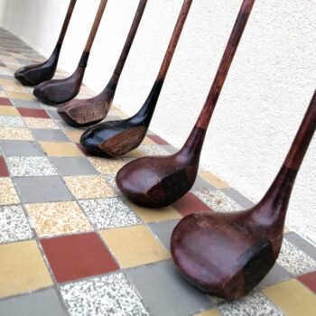 old clubs with their wooden heads