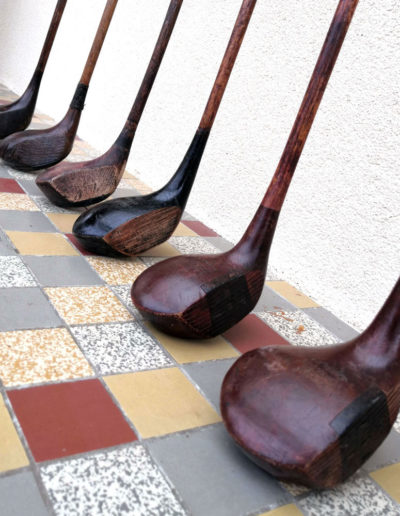 old clubs with their wooden heads