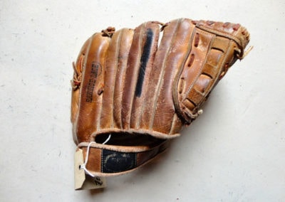 An antique glove to play baseball