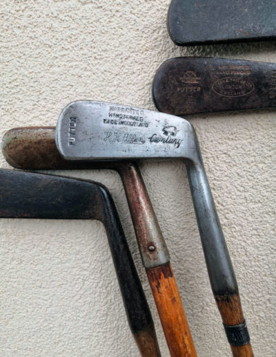 Ancien putter de golf en bois