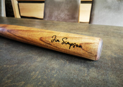 Old baseball bat with engraved name